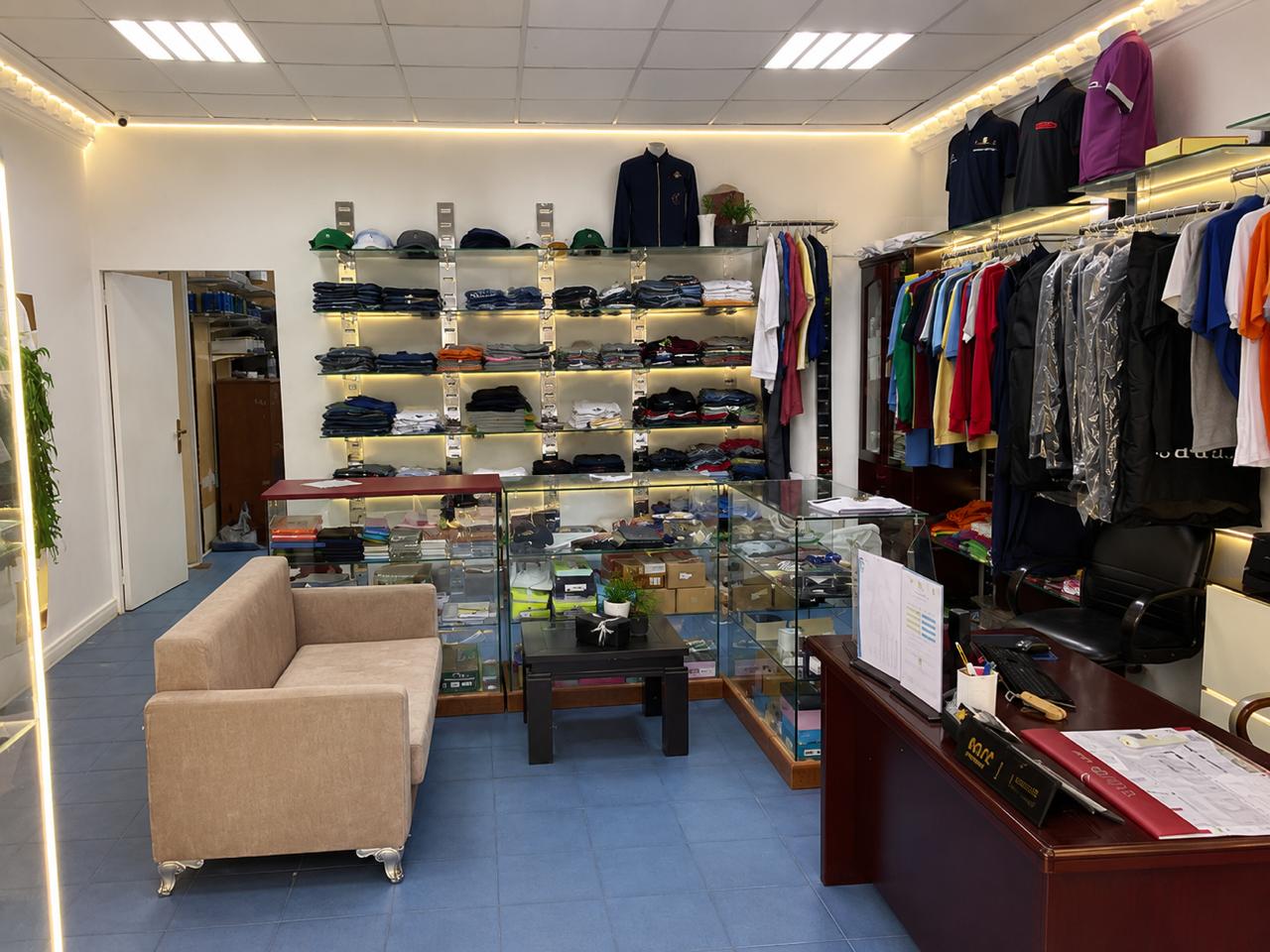 MAC Tailor uniform showroom shelves and display